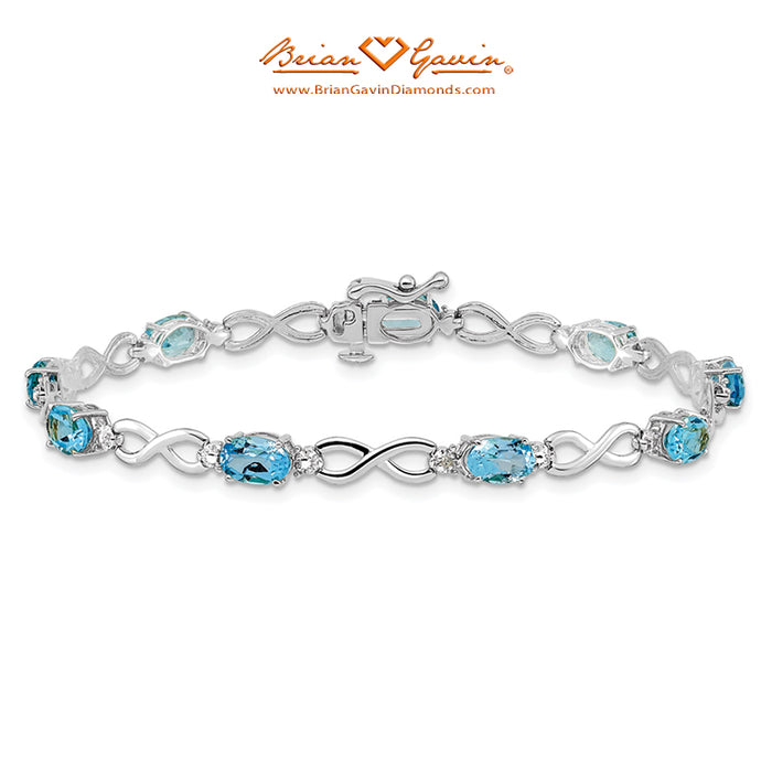 14K White Gold, Blue Topaz